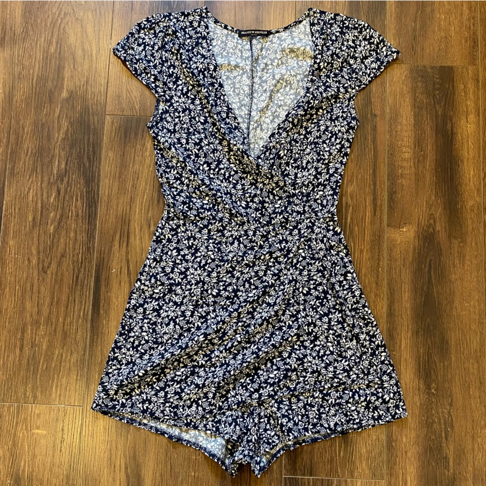 Brandy Melville navy floral romper size small short sleeve faux wrap